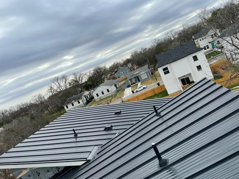 Standing seam metal roof panels with vents for Skylight Repair in Ogden
